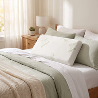 Bamboo Memory Foam Pillow with Zip Cover (50×30 cm), on a bed in a bedroom
