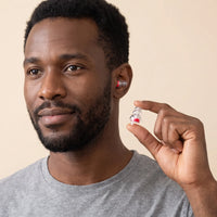 Red | High-Fidelity Concert Ear Plugs with Case, worn, man holding