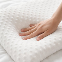 White | Orthopedic Memory Foam Pillow for Side Sleepers, textured memory foam surface, hand pressing