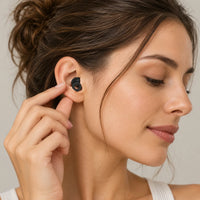 Black | Soft Silicone Ear Plugs for Sleeping & Swimming, worn, woman adjusting