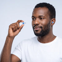 Blue | High-Fidelity Concert Ear Plugs with Case, worn, man holding