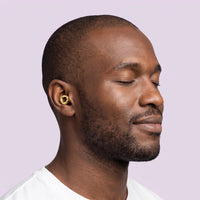 Golden | Quiet Silicone Ear Plugs for Sleep & Motorcycling, worn, man portrait