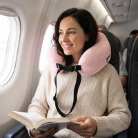 Pink | Fillable Washable U-Shaped Travel Pillow, worn, woman reading on an airplane