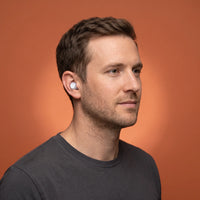 White | High-Fidelity Concert Ear Plugs with Case, worn, man wearing