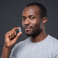 Purple | High-Fidelity Concert Ear Plugs with Case, worn, man holding