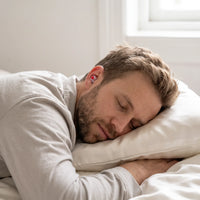 Red-05 | High-Fidelity Washable Silicone Ear Plugs, worn, stomach pillow