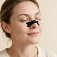 Extra Strength Anti-Snoring Nasal Strips, woman wearing a nasal strip