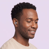 Silver 1 | Quiet Silicone Ear Plugs for Sleep & Motorcycling, worn, man portrait