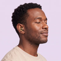 Golden 1 | Quiet Silicone Ear Plugs for Sleep & Motorcycling, worn, man portrait