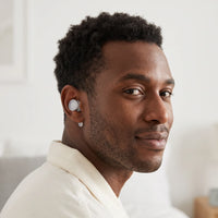 White-04 | High-Fidelity Washable Silicone Ear Plugs, worn, over shoulder
