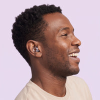 Transparent 1 | Quiet Silicone Ear Plugs for Sleep & Motorcycling, worn, man portrait