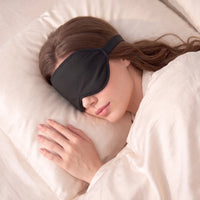 Black | 3D Sculpted Breathable Sleep Mask, worn, sleeping on pillow