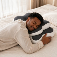 DARK GRAY | Butterfly Dual-Height Cervical Pillow, man sleeping on his stomach hugging the pillow