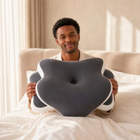 DARK GRAY | Butterfly Dual-Height Cervical Pillow, man holding up the pillow