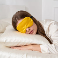 Golden Yellow | Soft Silk Blackout Sleep Mask, worn, stomach sleep