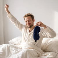 Navy | Soft Silk Blackout Sleep Mask, worn, morning stretch