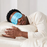 Sky Blue | Soft Silk Blackout Sleep Mask, worn, hugging pillow