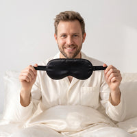 Black | Soft Silk Blackout Sleep Mask, worn, stretching strap