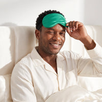 Jade Green | Soft Silk Blackout Sleep Mask, worn, pushing up