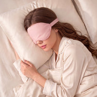 Pink | 3D Sculpted Breathable Sleep Mask, worn, sleeping on pillow