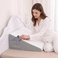 White and Gray | Foam Wedge Pillow for Elevated Sleeping, woman putting a phone into the side pocket